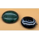 Two White metal and hardstone brooches. [Malecite and agate]