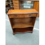 Mahogany and Bur walnut bow front bookcase with fitted drawers.