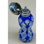 Antique facet cut glass perfume bottle, designed with white and blue glass sectioned glass. Fitted
