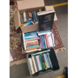 3 boxes of various books.