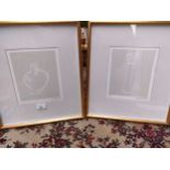 Pair of modern vase art pictures signed and set in framing.