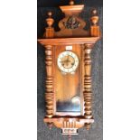 Antique long cased wall clock with pendulum