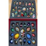 A Boxed set of glass Christmas decorations.