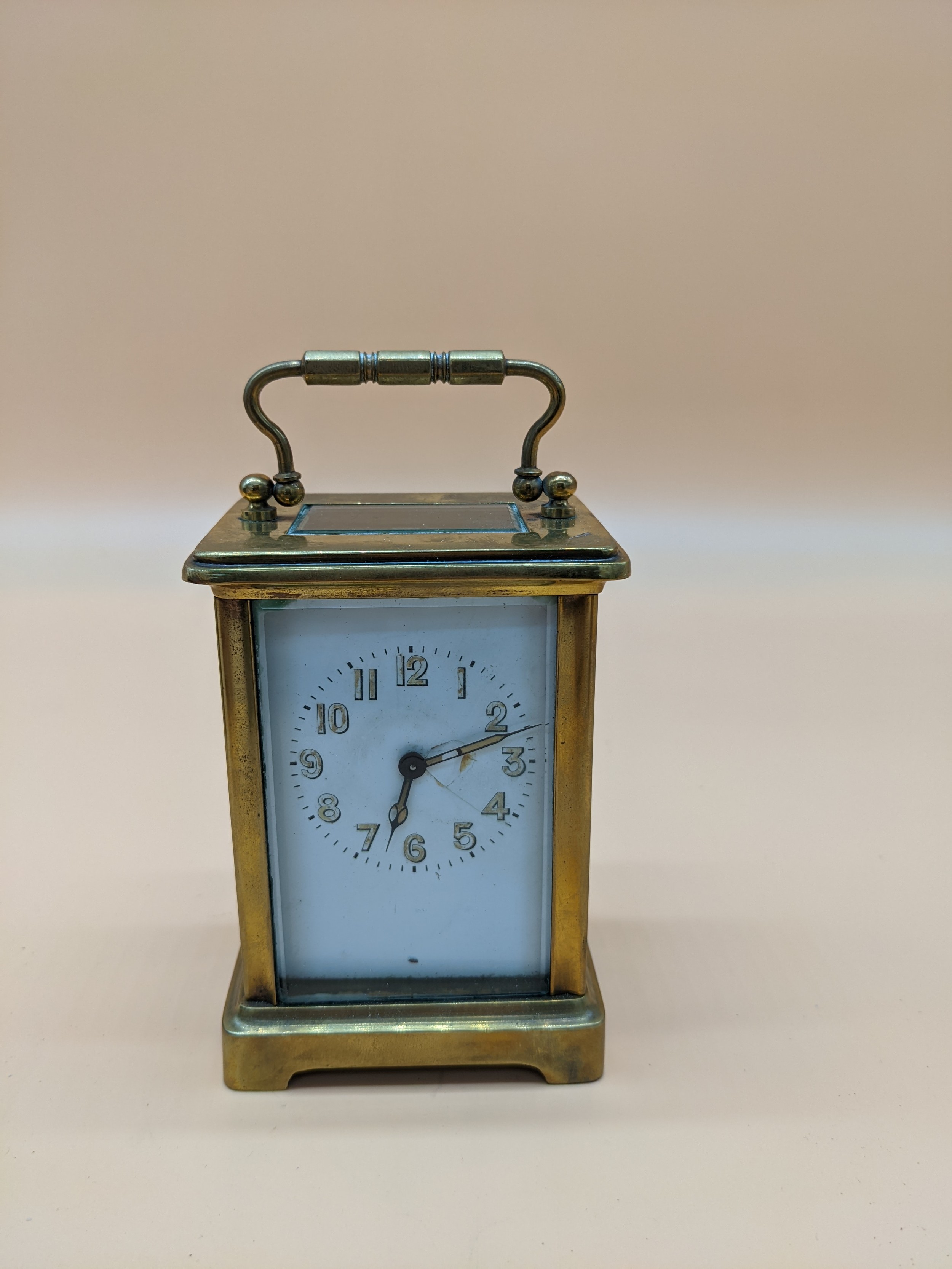 Antique French brass carriage clock with single drum movement, within case