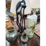 Large ceramic umbrella stand, stylish metal planter and jug together with African carved figure.