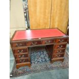 Reproduction Red Leather top knee hole writing desk.