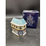 Royal crown Derby the sweet shop figure with box . 8cm in height .