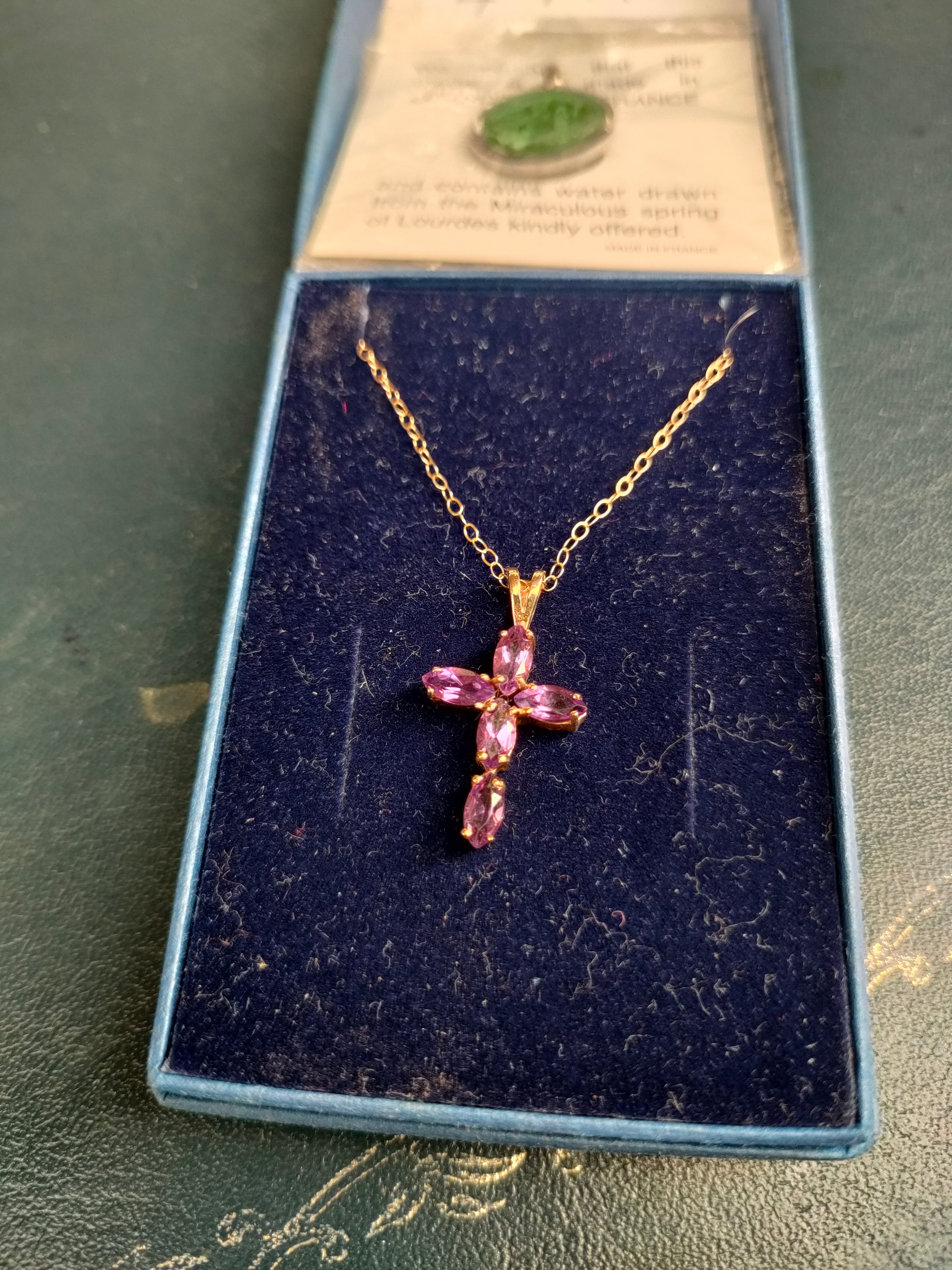 9ct gold chain set with 9ct gold cross with purple stones together with Lourdes France medal . - Image 3 of 4