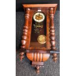 Antique mahogany long cased wall clock, with key and pendulum