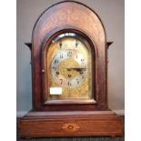 19th century bracket clock, case detailed with marquetry inlays. Movement by Junghans, comes with