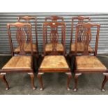 Lot of six Georgian chairs, the shaped back with carved pierced central splat above leather seat,