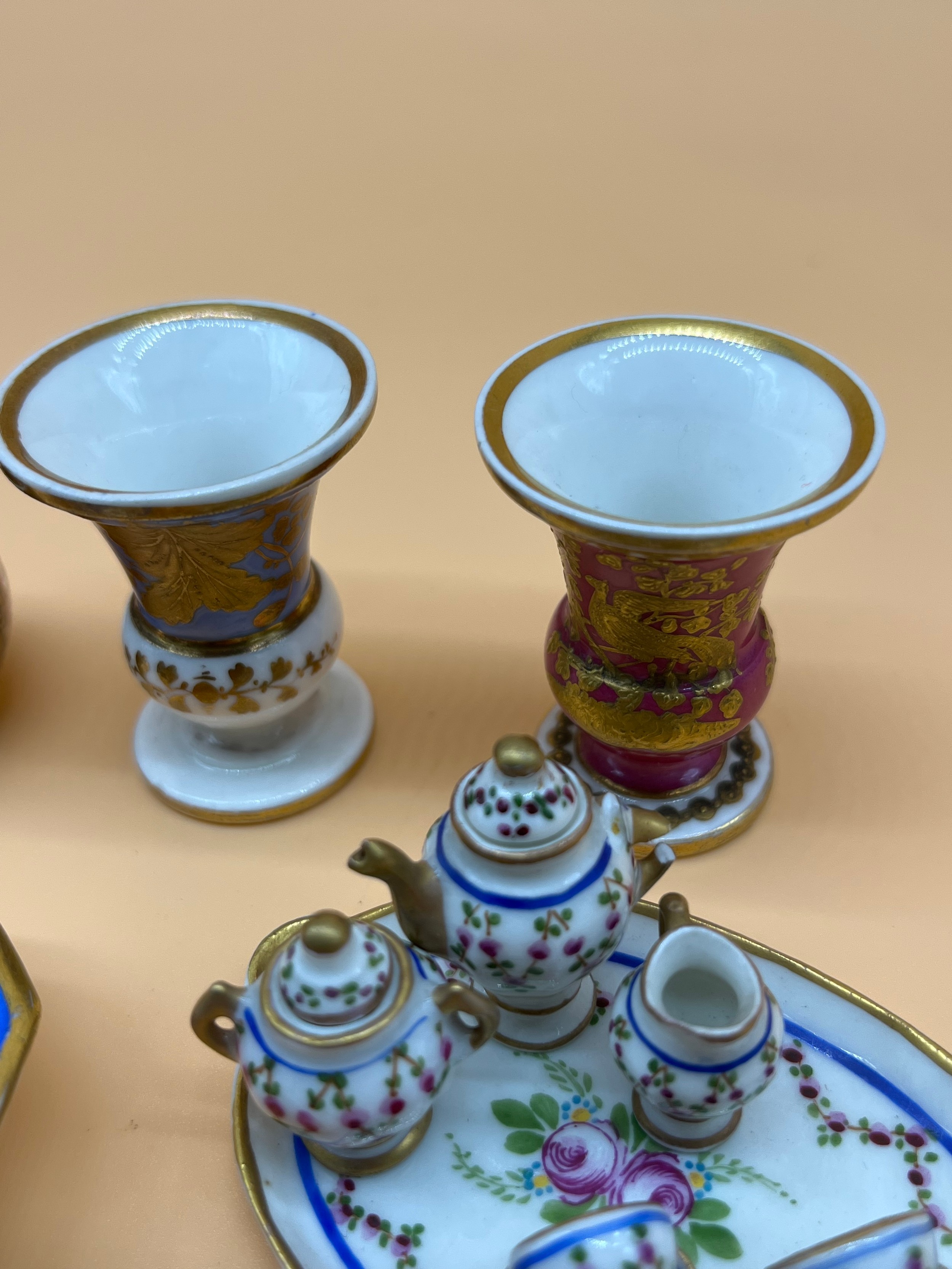 Collection of collectable miniature porcelain items to include Dolls tea for two service, Urn vases, - Image 4 of 5