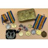 WW1 Princess Mary Christmas Tin, containing various medals and cap badges. Two sets of WW1 War and