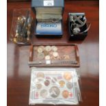 Selection of various watches and coins