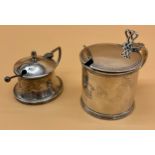 Two Birmingham silver condiment pots, One with blue liner and two silver spoons.