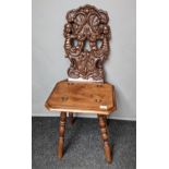 [Edward Holmes Baldock] WALNUT CHAIR, 19TH CENTURY, The back carved with faces surrounded by