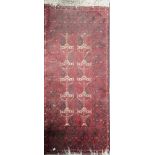 Antique rug in a red tone