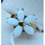 9ct yellow gold ring set with 5 opal stones in a floral design. [5.85grams] [Ring size N]