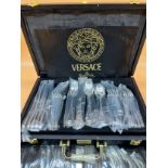 A 48 piece canteen of silver-plated Versace Rosenthal cutlery presented in ebonized case with gilt