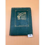 The Triumph stamp album containing a large quantity of stamps from around the world. [Will post]