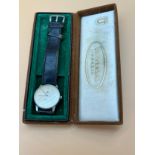 Gent's 1957 Universal Geneve evening wristwatch. Comes with original box. Serial Number 1915262.