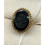 9ct yellow gold and carved black onyx cameo set ring. [Ring size K] [3.10gram]