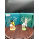 Beswick Peter rabbit figure together with beswick calypso kitten figure with boxes .