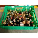 Large collection of miniatures to include Dimple, Black Bush, Bell's, Drambuie and many others