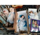 A collection of various vintage dolls