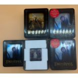 Four tins of Lord of the Rings The Return of the King sealed card sets.