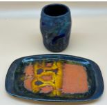 Two pieces of studio pottery. Eric Leaper Newlyn Orange glazed tray, the other signed P.M. to the