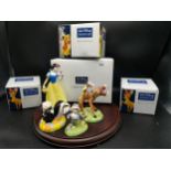 A Group lot of Disney showcase figures includes snow white , Bambi etc.