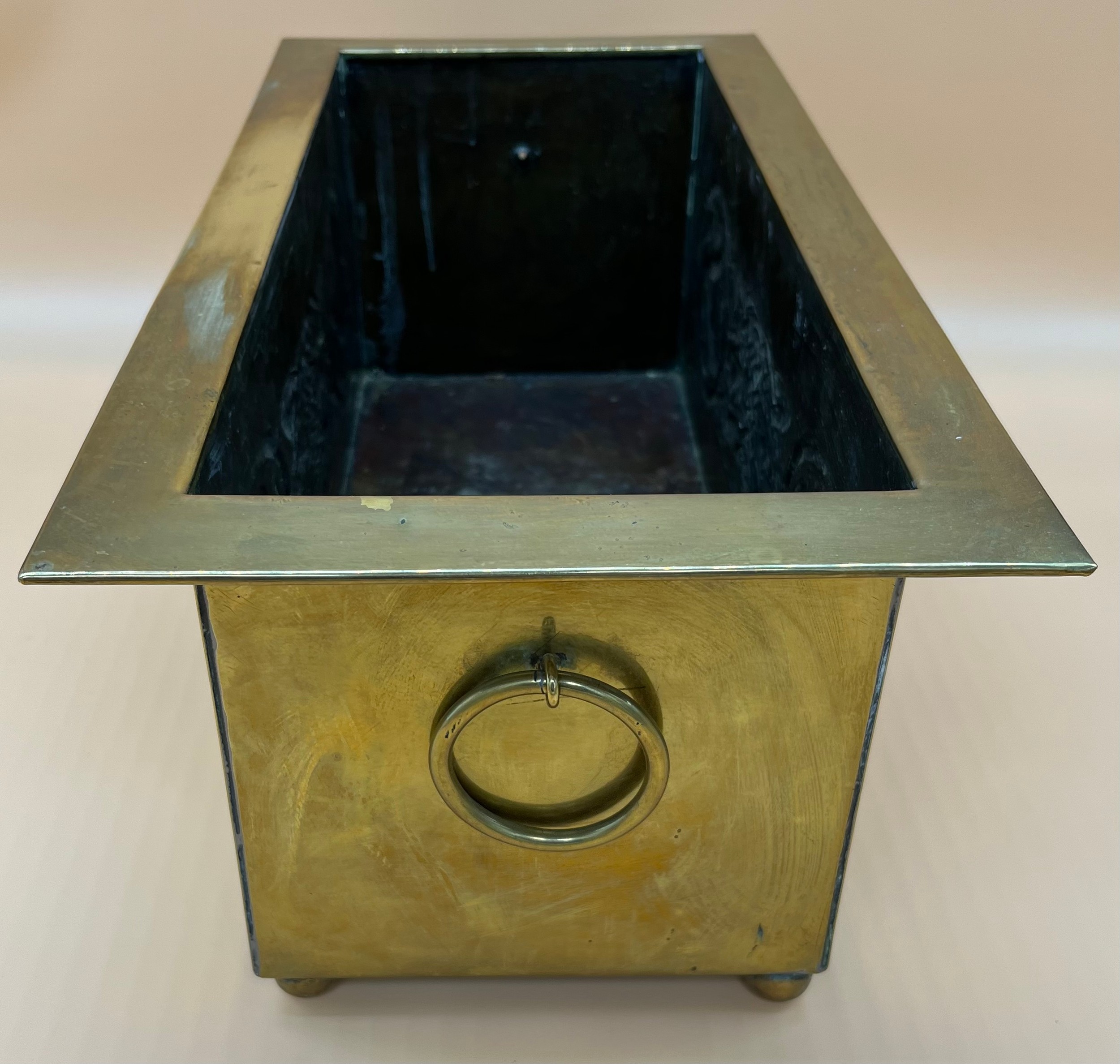 Arts and Crafts brass worked planter. detailed with Celtic panels. [Missing handle] [19x49x24cm] - Image 4 of 6