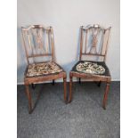 Pair of regency chairs, the shaped back with brass inlay and central moulded X splat, flanked by two