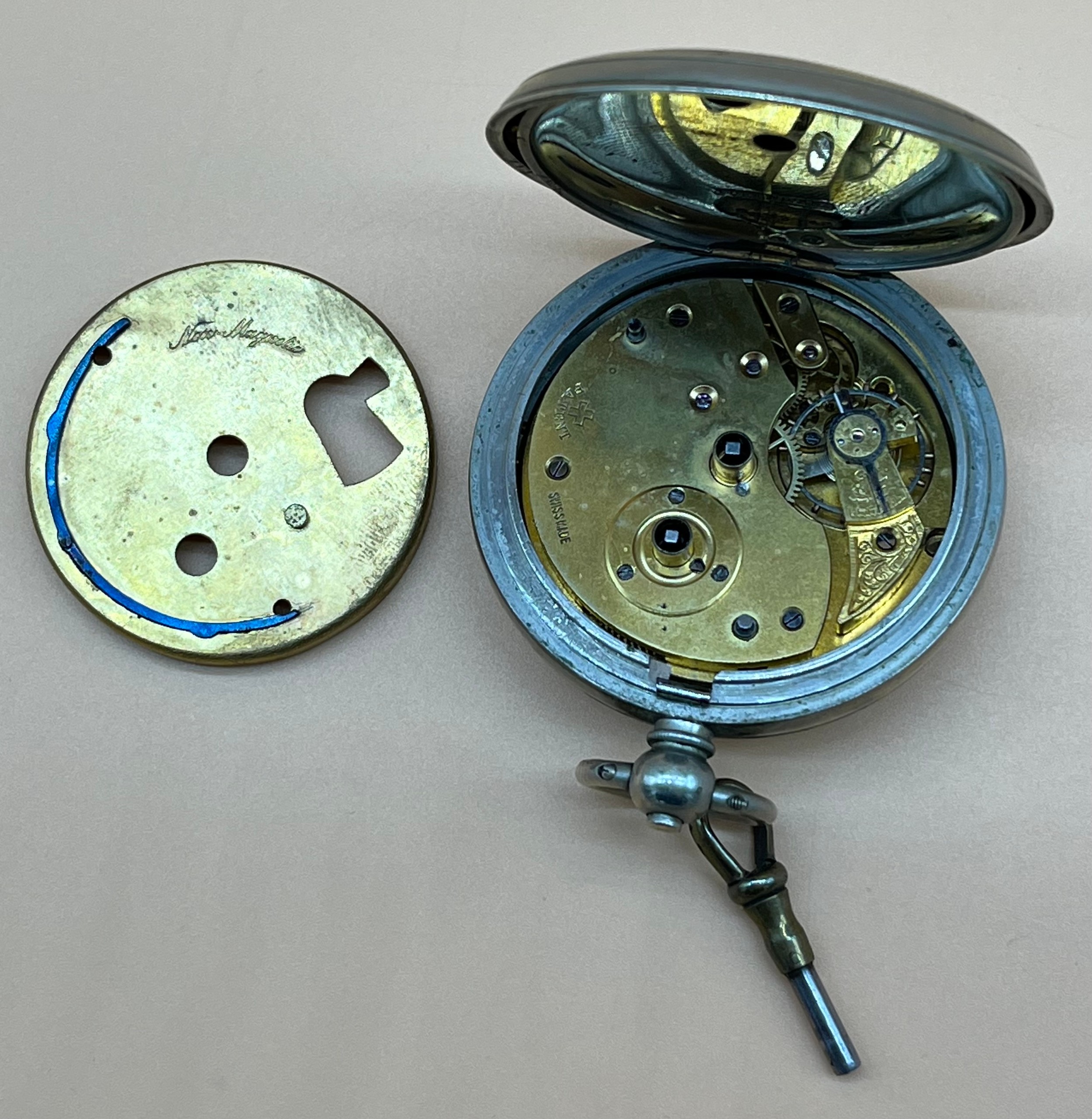Antique pocket watch fitted within a nickel case, Enamel face. Swiss made New Magnetic. Comes with a - Image 2 of 4