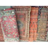 Collection of 4 persian style rugs . af.