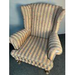 19th century gull wing armchair, the whole covered in a stripe material, raised on cabriole legs