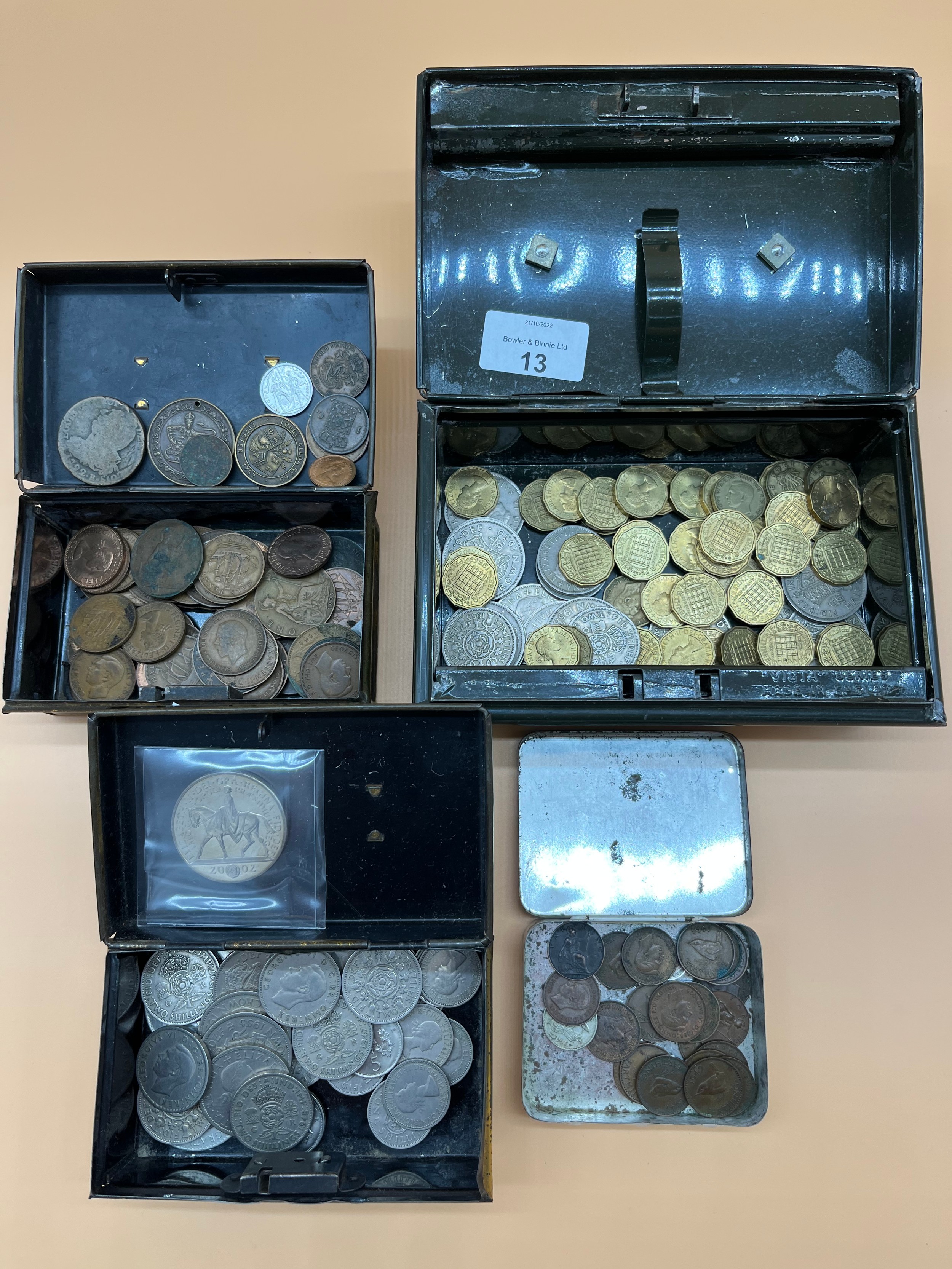 Four tins of various British coinage, Includes Masonic coin, one pennies, Three pence and crowns