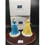 Royal doulton Disney showcase figures princess Belle and Cinderella with boxes .