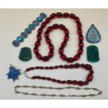 A Collection of collectable odds to include two sets of cherry amber style bead necklaces, Jade