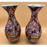 A Large pair of Japanese hand painted Imari design vases. [One as found] [39cm high]