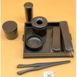 early 20th century ebony dressing table tray and accessories to include brushes and glove stretcher