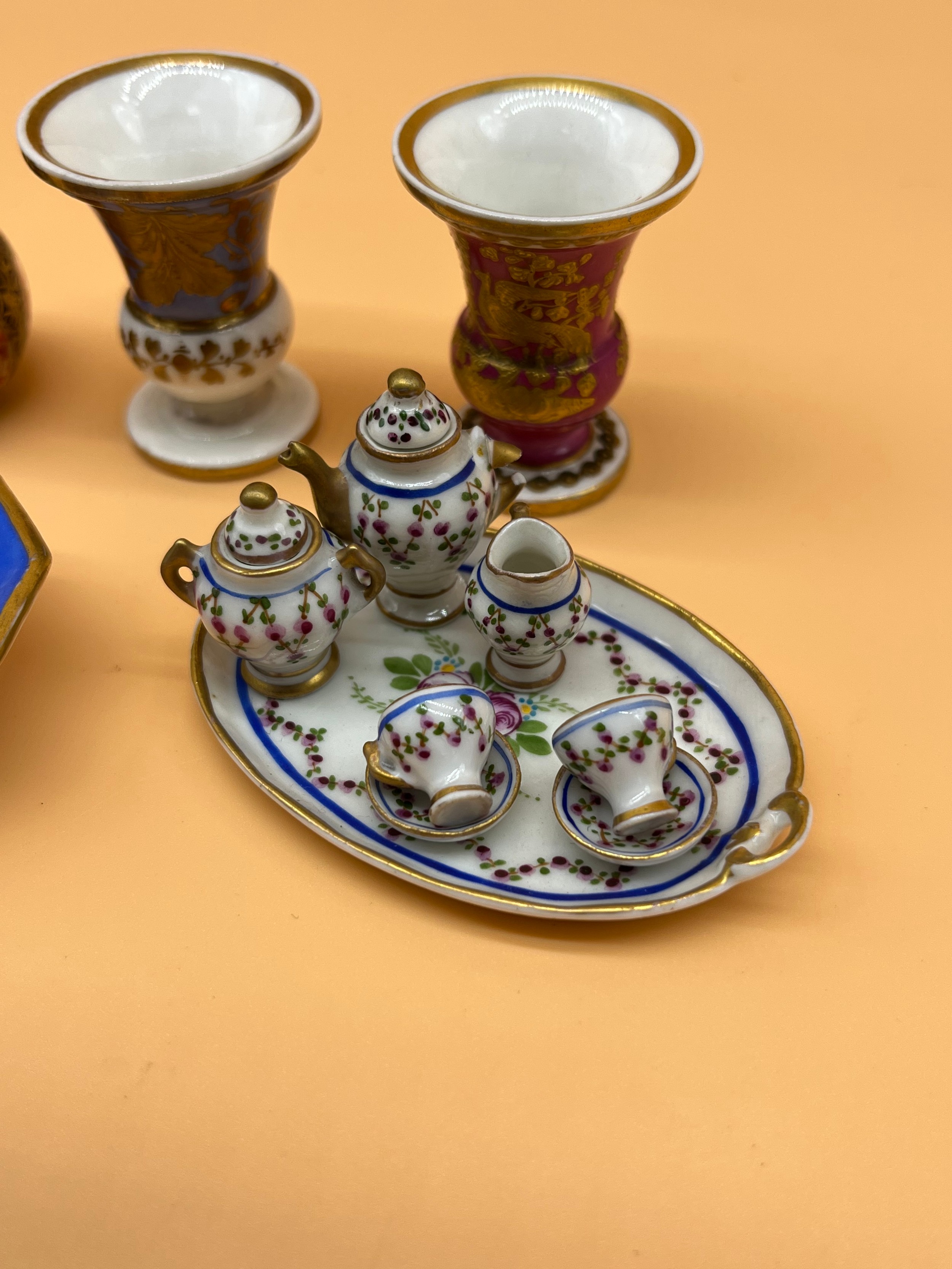 Collection of collectable miniature porcelain items to include Dolls tea for two service, Urn vases, - Image 2 of 5