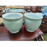 Pair of Chinese celadon planters as found .