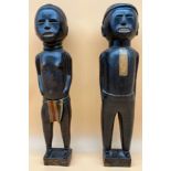 Two Antique African Tribal hand carved figures. Him and her figures. Lady designed with weaved
