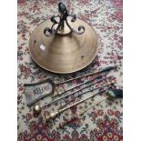 Arts and crafts brass ceiling light together with brass fire utensils.