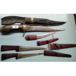 Collection of decorative north American style daggers, Gurka style knife etc.