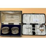 Boxed Sheffield Silver spoon and pusher together with a pair of Birmingham silver Napkin rings. [