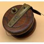 Antique wood and brass Milwards fly fishing reel.