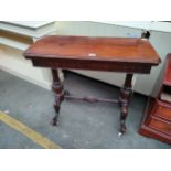 19th century ornate folding games table with casters.